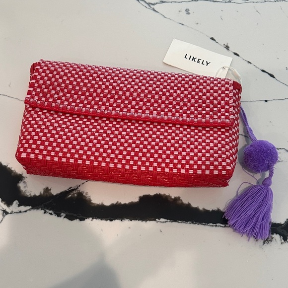 Likely Red and Light Pink Checkered Clutch with Purple Tassel - Picture 1 of 5